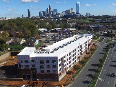 Aerial view of a multi-story building under construction